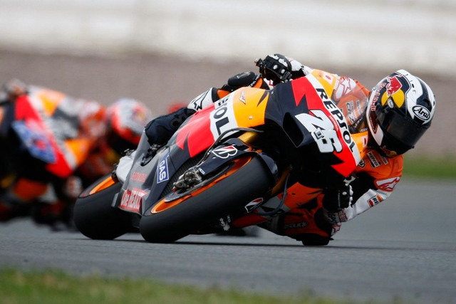 Motorcycle race track rider helmet free wallpaper - medium preview image
