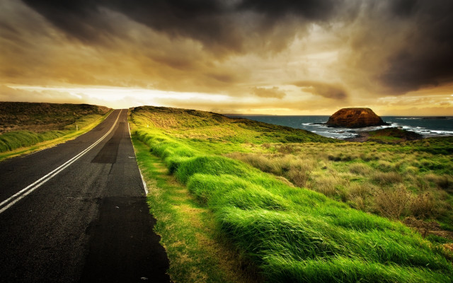 Lush green ocean road cloudy free wallpaper - medium preview image