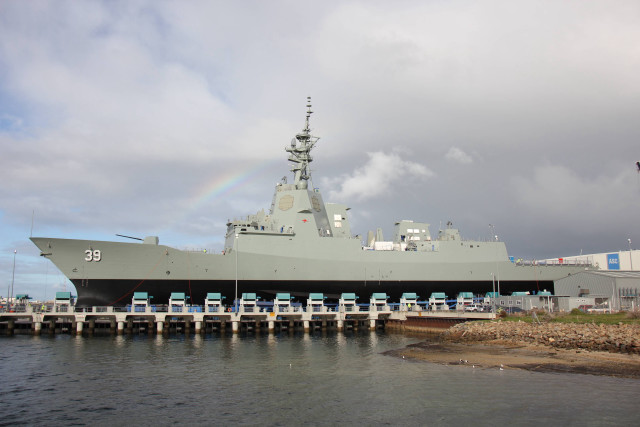 Military ship docked pier rainbow free wallpaper - medium preview image