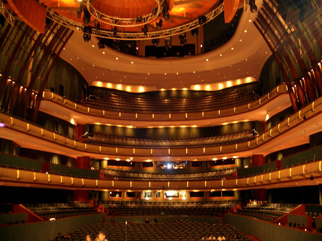 Auditorium seats stage lights people free wallpaper - medium preview image