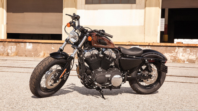Motorcycle parked road building closed free wallpaper - medium preview image