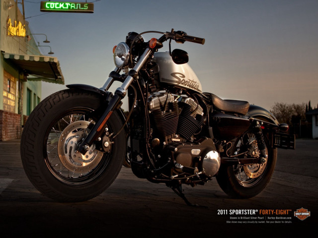 Motorcycle parked building neon sign #2 free wallpaper - medium preview image