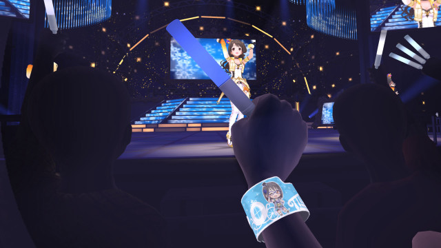 Person holding blue object stage free wallpaper - medium preview image