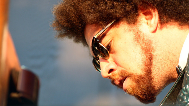 Bearded man sunglasses cellphone tie free wallpaper - medium preview image