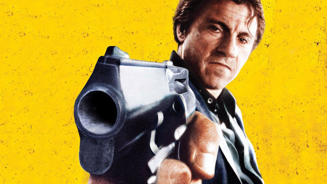 Man gun pointing camera yellow free wallpaper - medium preview image