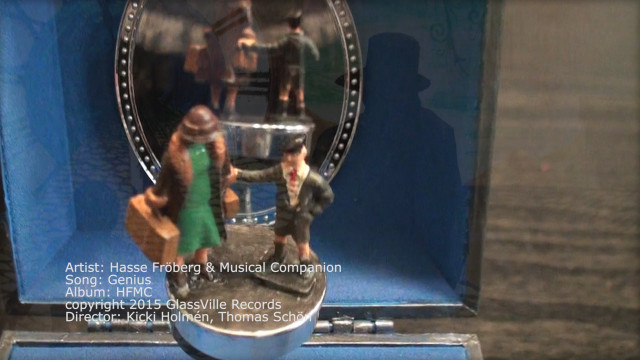 Toy figurine mirror blue background free wallpaper - medium preview image
