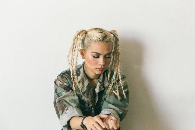 Woman ponytail sitting hands knees free wallpaper - medium preview image