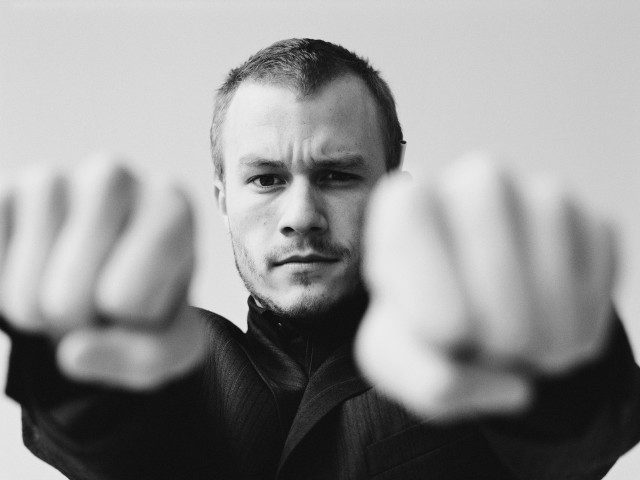 Man suit pointing serious face free wallpaper - medium preview image