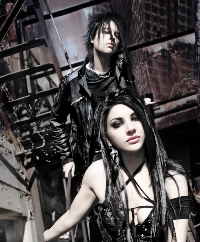 Goth couple posing stairwell building free wallpaper - medium preview image