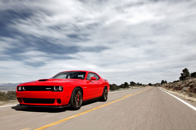 Red car driving road cloudy #4 free wallpaper - medium preview image