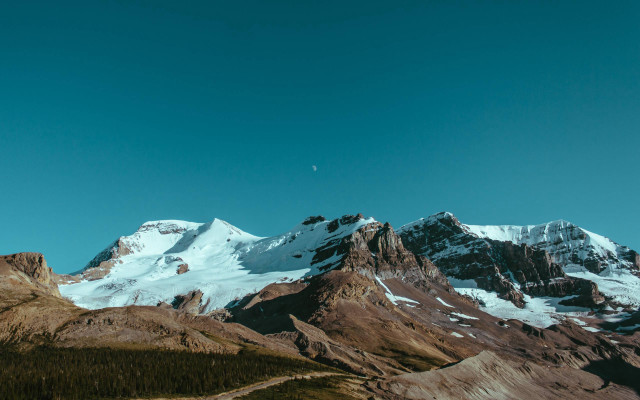 Mountain range snow covered background free wallpaper - medium preview image