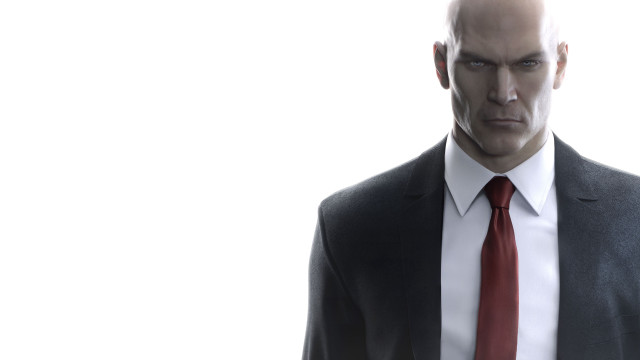 Man suit tie bald serious free wallpaper - medium preview image