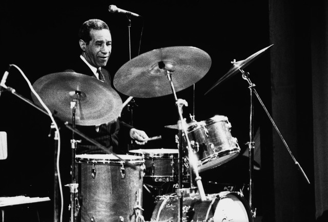 Man playing drums stage microphone free wallpaper - medium preview image