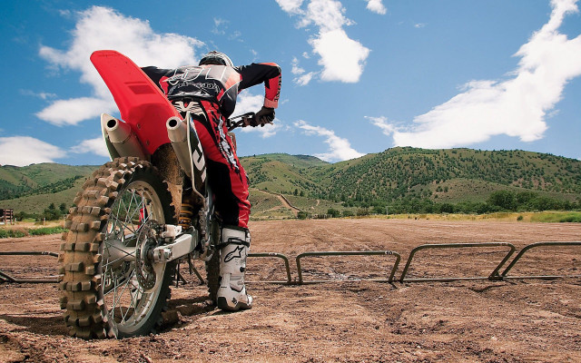 Dirt bike rider mountains blue free wallpaper - medium preview image