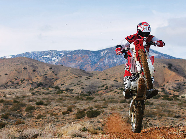 Dirt bike desert mountains cloudy free wallpaper - medium preview image