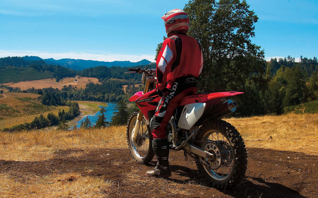 Man red jacket red motorcycle free wallpaper - medium preview image
