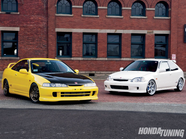 Two cars parked building windows free wallpaper - medium preview image