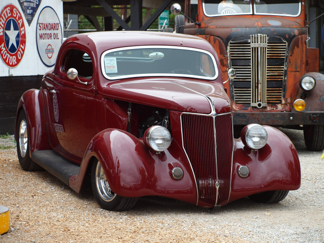 Red car truck parking lot free wallpaper - medium preview image