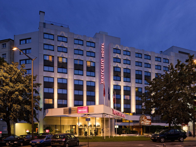 Large hotel building lit sign free wallpaper - medium preview image