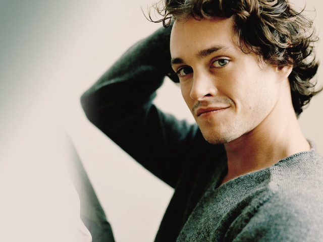Curly hair man hologram knife free wallpaper - medium preview image