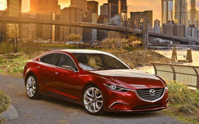 Red car city skyline bridge free wallpaper - medium preview image
