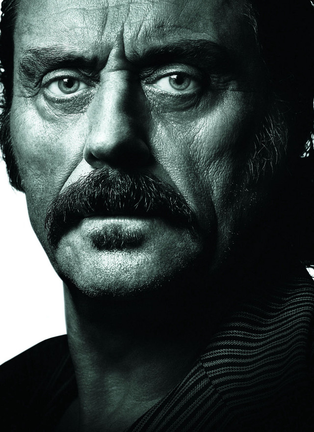 Man mustache serious look camera #2 free wallpaper - medium preview image