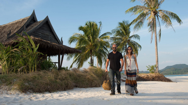 Beach palm trees hut man free wallpaper - medium preview image