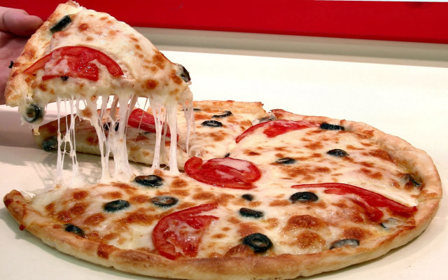 Person taking slice pizza white free wallpaper - medium preview image