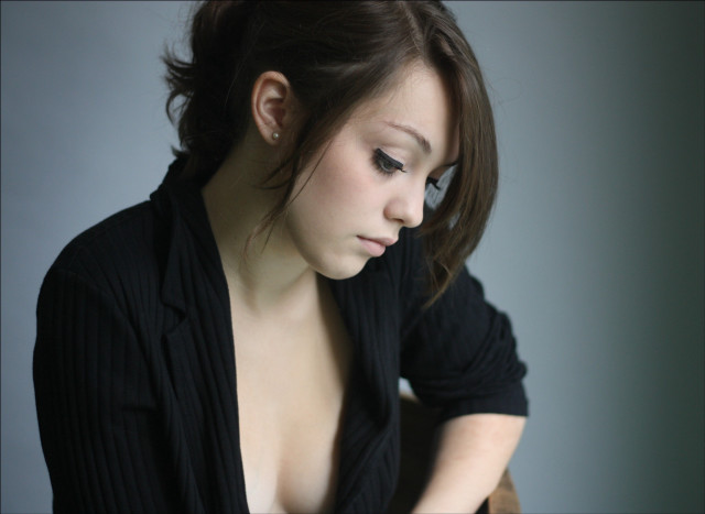 Woman black shirt jacket cellphone free wallpaper - medium preview image