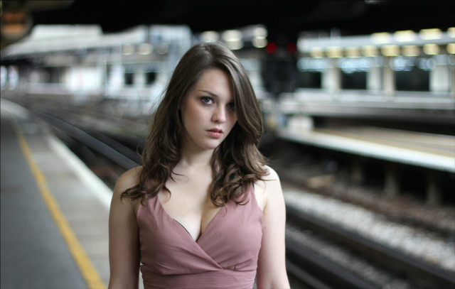 Woman pink dress train station free wallpaper - medium preview image