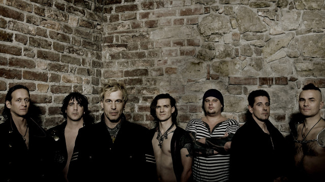 Men group brick wall standing #3 free wallpaper - medium preview image