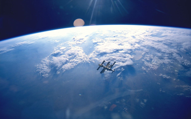 Space shuttle flying over earth #2 free wallpaper - medium preview image