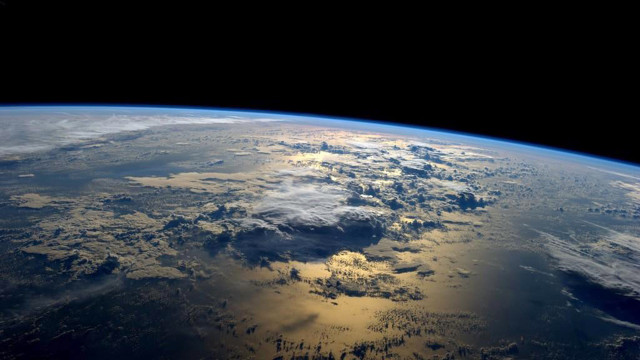 Earth space sun clouds night free wallpaper - medium preview image