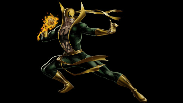 Man green gold costume running free wallpaper - medium preview image