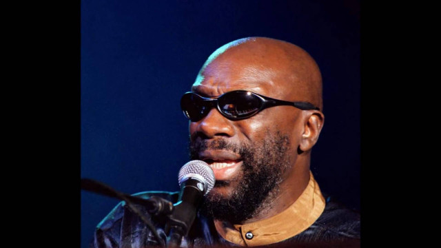Bald man sunglasses microphone singing free wallpaper - medium preview image