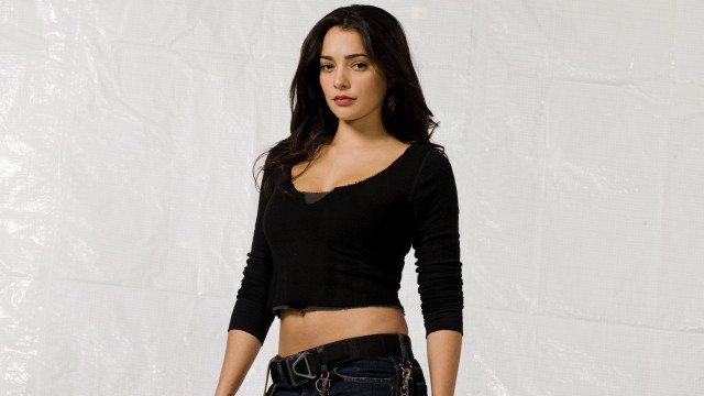 Woman black top jeans white free wallpaper - medium preview image