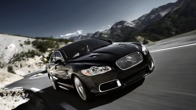 Black car mountain road snow free wallpaper - medium preview image