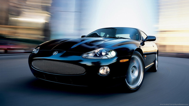 Black sports car city street #2 free wallpaper - medium preview image