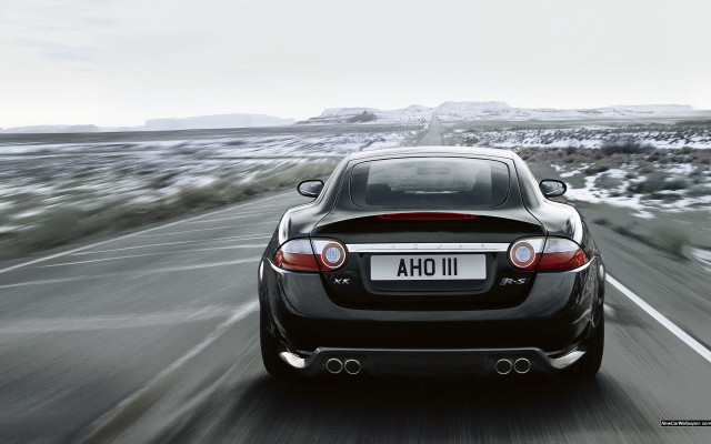Black car mountain snow road free wallpaper - medium preview image