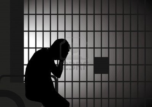 Man sitting jail cell head free wallpaper - medium preview image