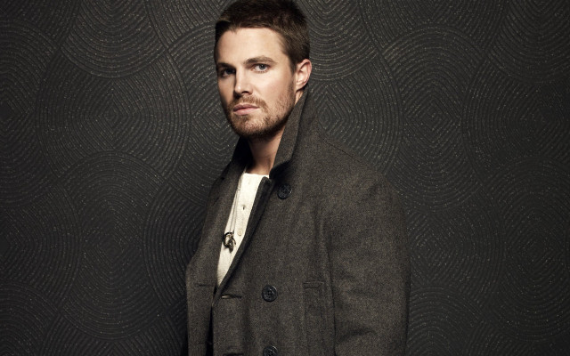 Man coat standing black wall free wallpaper - medium preview image