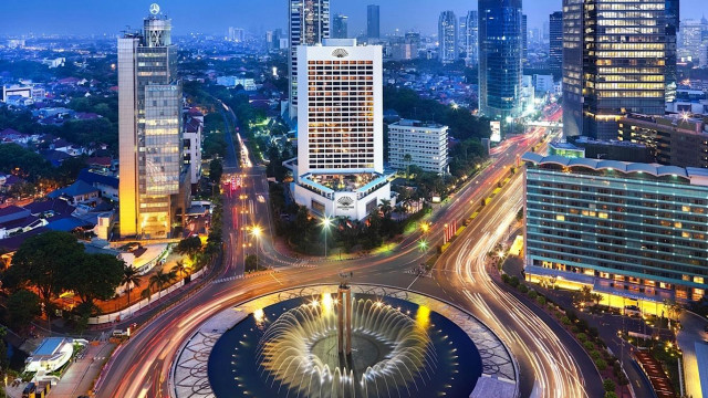 City fountain night lights buildings free wallpaper - medium preview image
