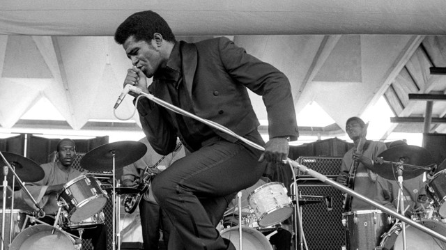 Man suit tie stage microphone free wallpaper - medium preview image