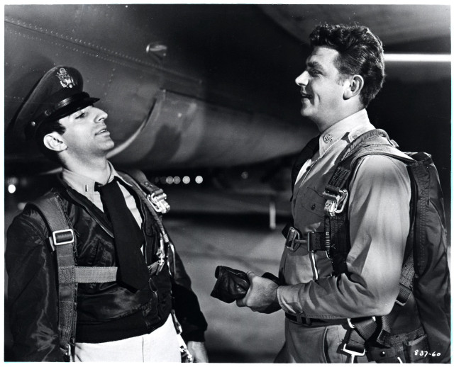 Man pilot uniform talking another free wallpaper - medium preview image