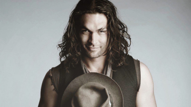 Man hat vest posing camera free wallpaper - medium preview image