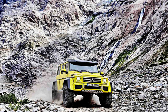 Yellow truck rocky road mountain free wallpaper - medium preview image