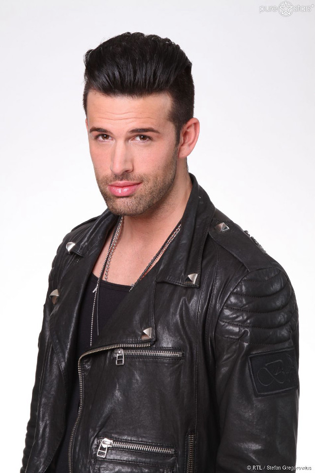 Man black leather jacket posing free wallpaper - medium preview image