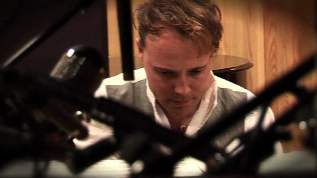Man sitting microphone recording studio free wallpaper - medium preview image