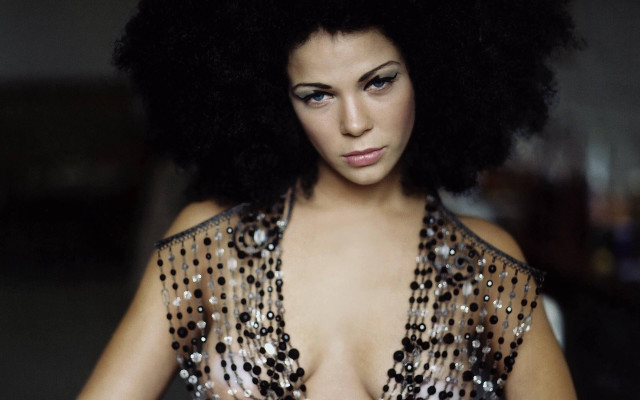 Woman large afro posing hands free wallpaper - medium preview image