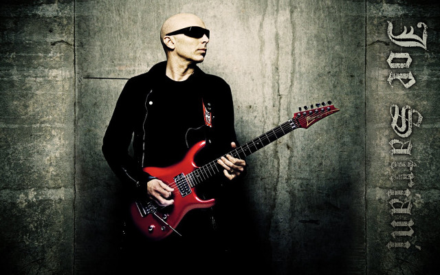 Man sunglasses red guitar wall free wallpaper - medium preview image
